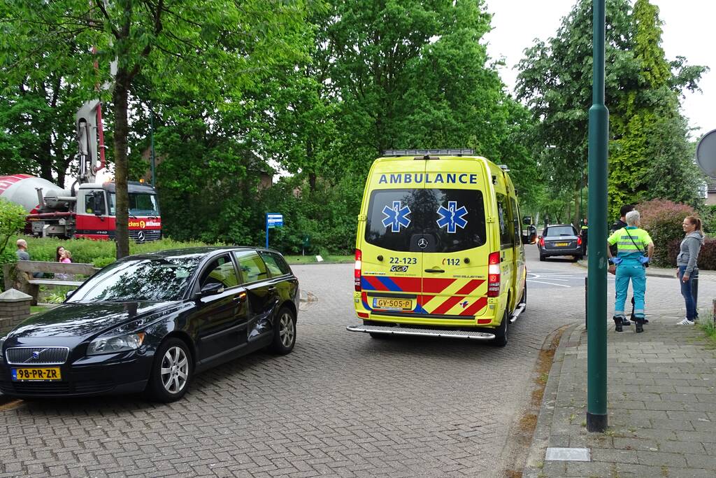 Schade na botsing op kruising