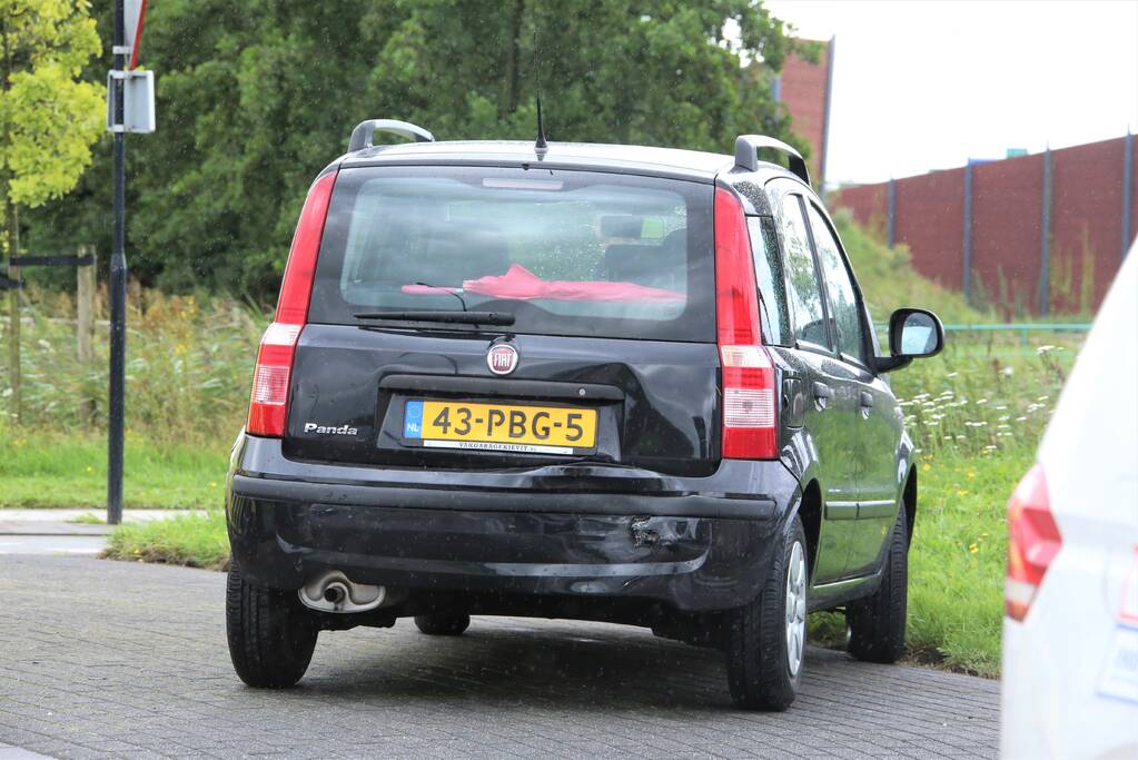 Kop-staartbotsing op rotonde