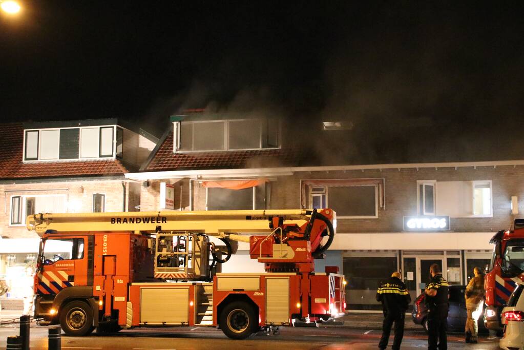 Grote schade en ravage bij winkelbrand