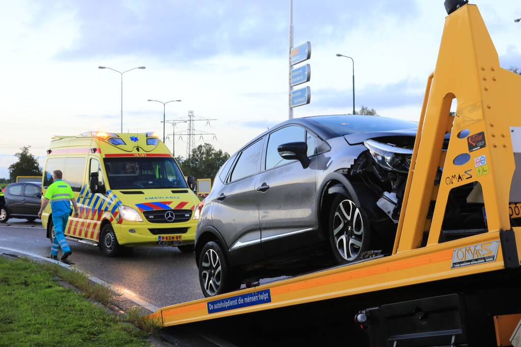 Auto te water na aanrijding