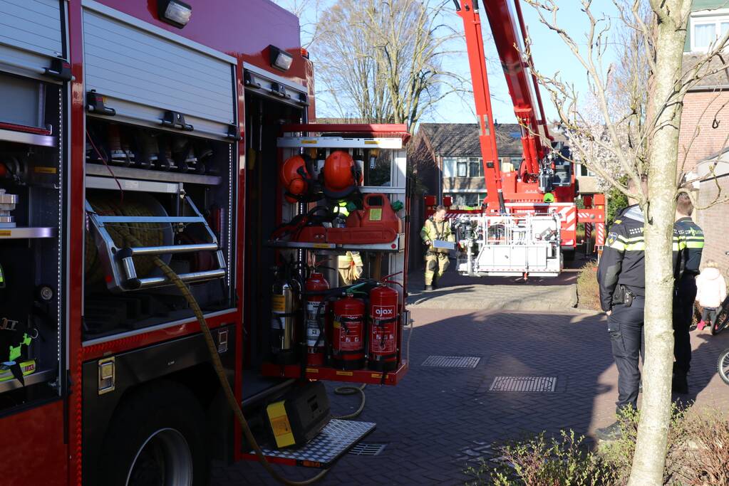 Veel rook bij schoorsteenbrand