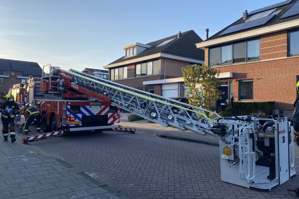 Brand in schoorsteen van woning