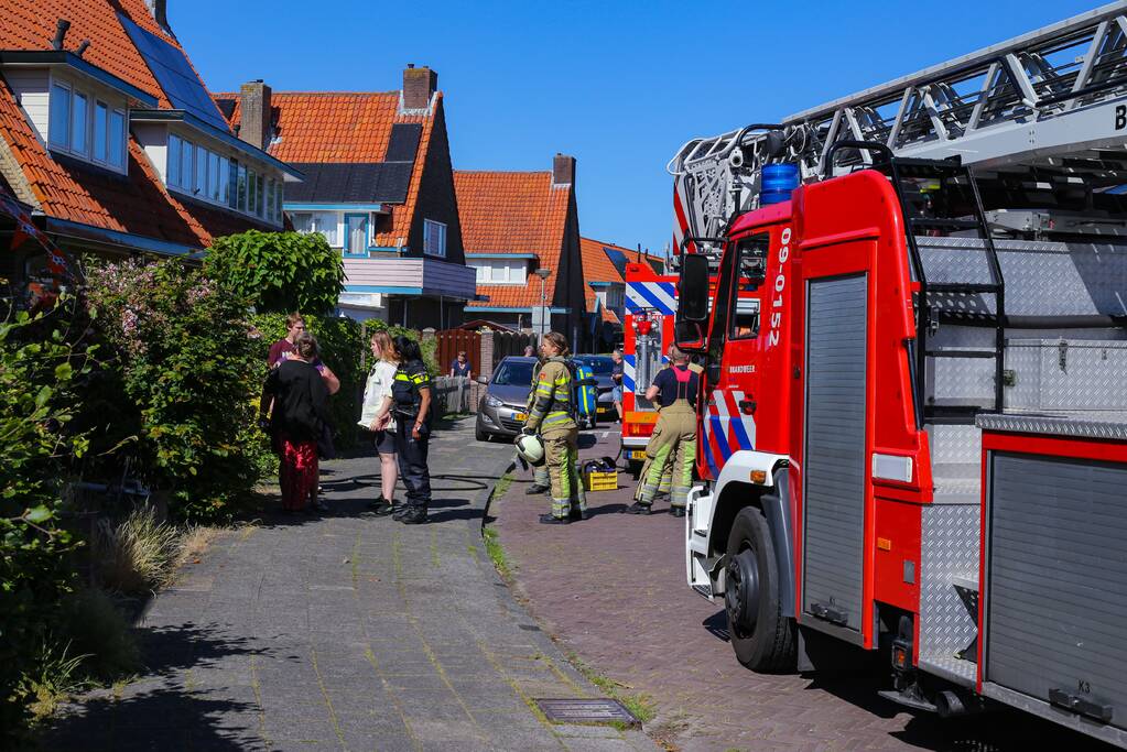 Grijze rookontwikkeling brand in woning