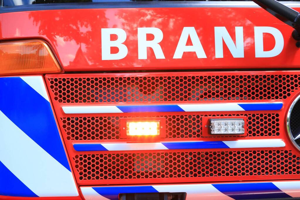 Woningen ontruimd bij brand in winkel