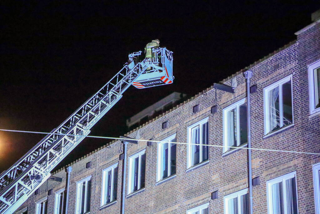 Meerdere woningen ontruimd bij grote brand