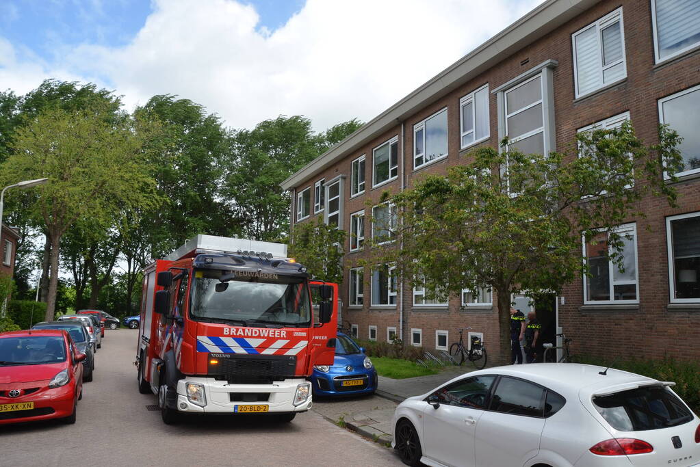 Brand in keuken van portiekwoning