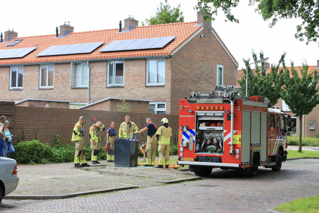 Ondergrondse container in brand