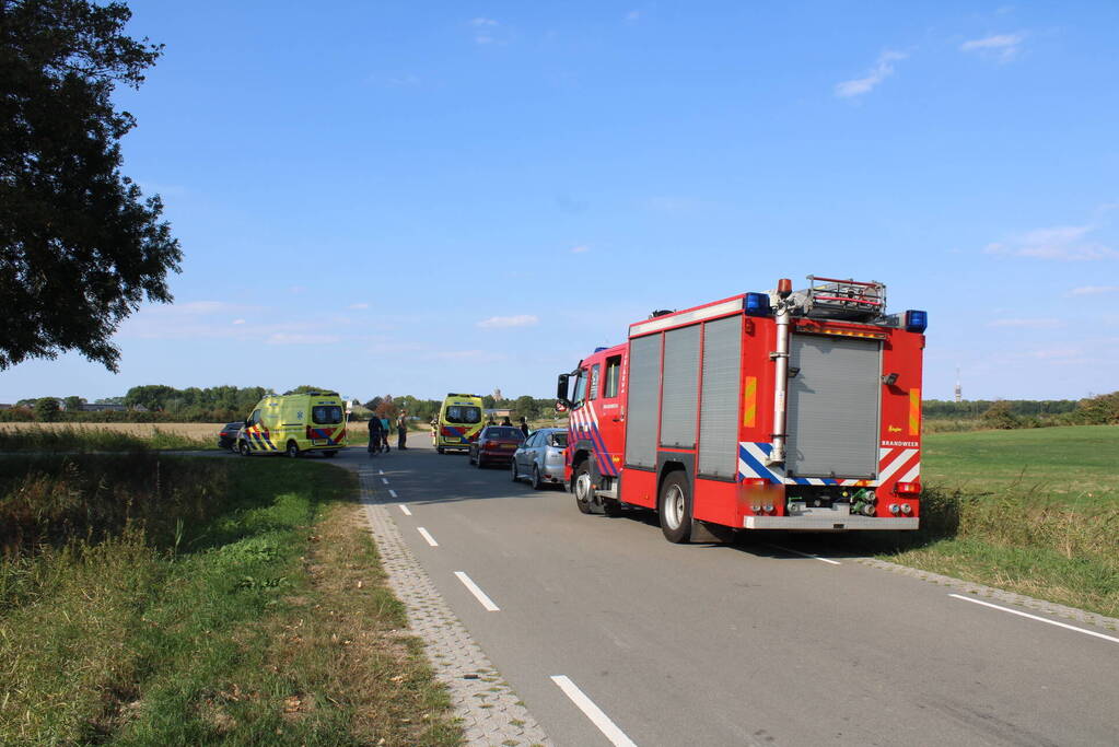 Scootmobiel en racefietser botsen op elkaar