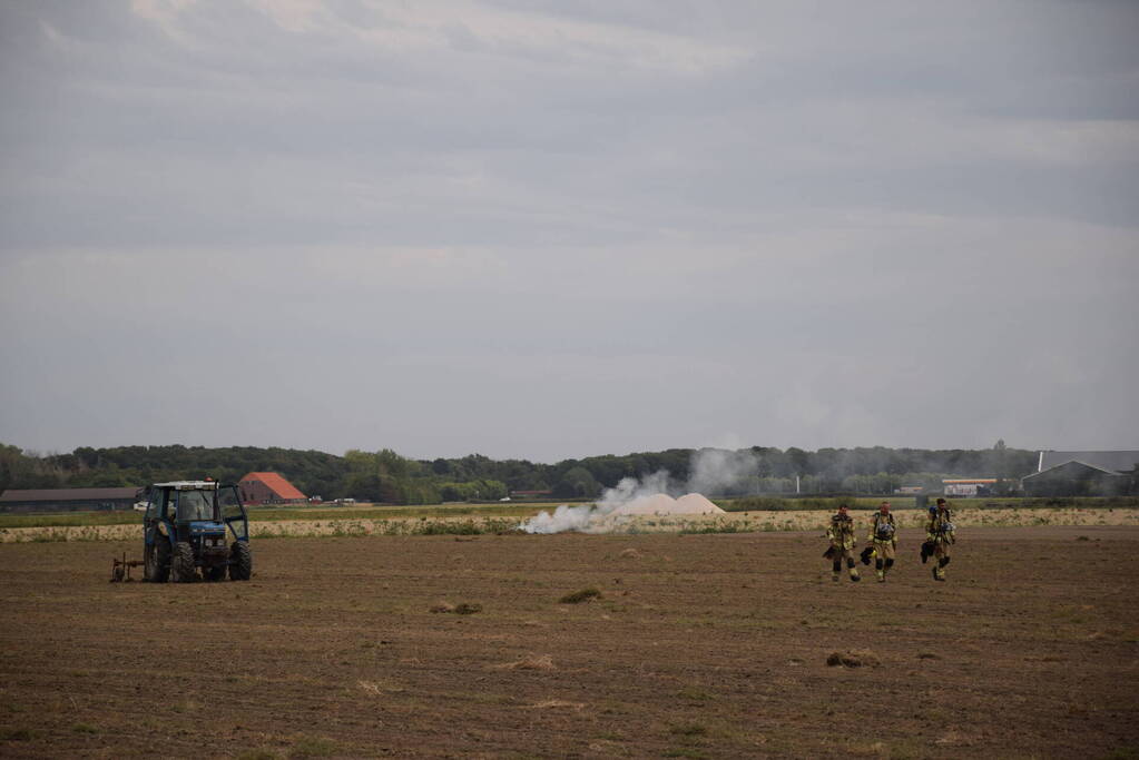 Brand door omploegen van weiland