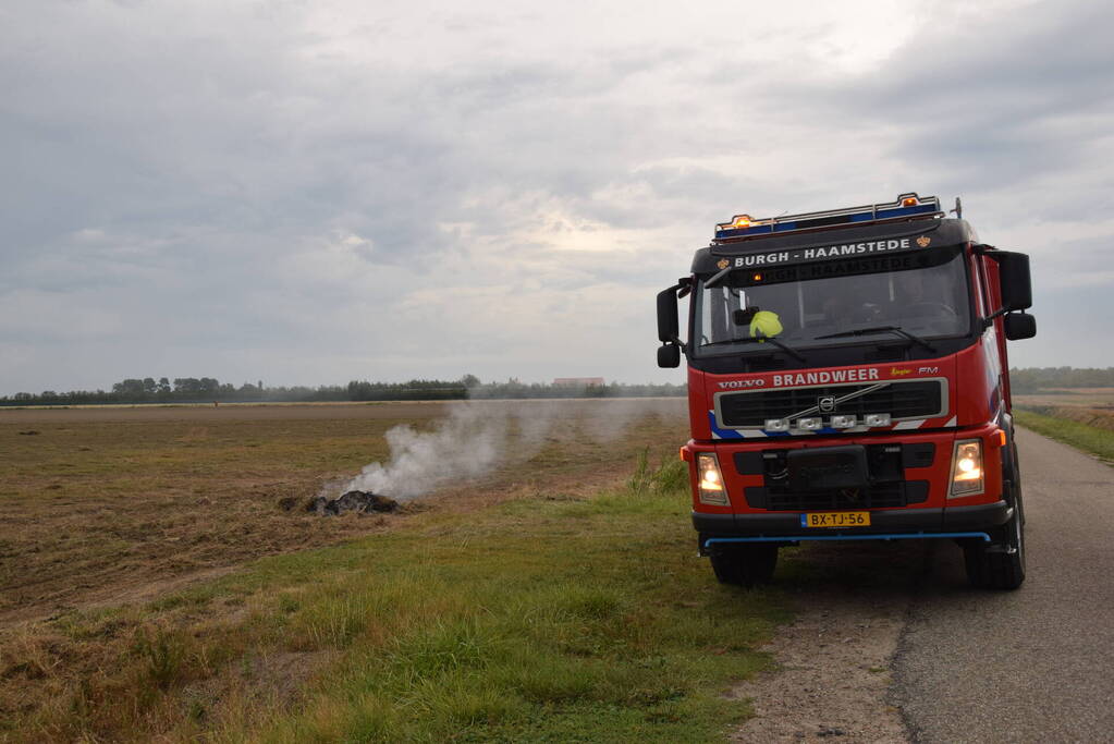 Brand door omploegen van weiland