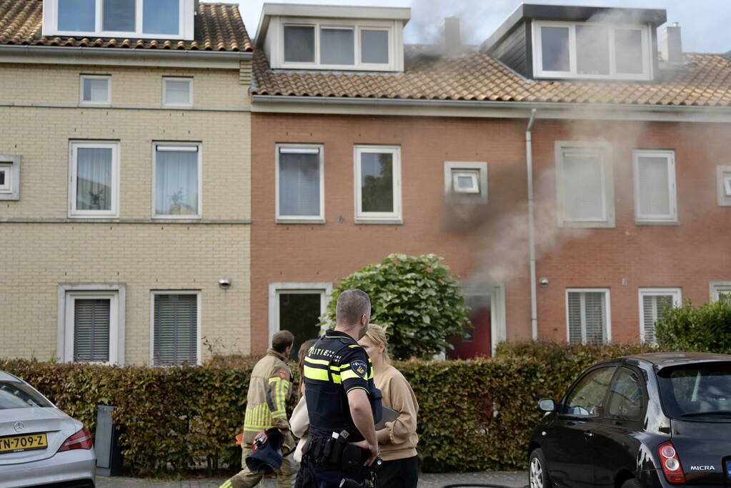 Flinke rookontwikkeling bij brand in woning