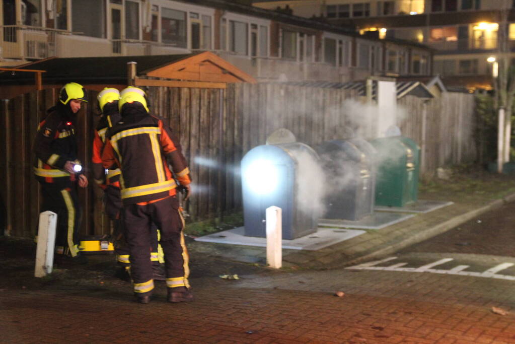 Ondergrondse container in brand