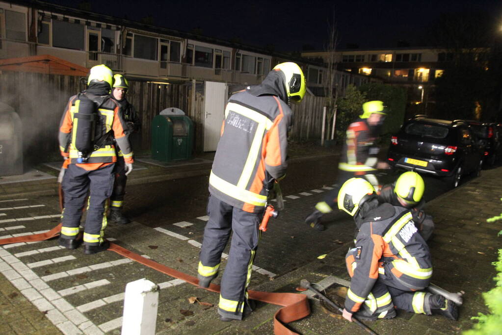 Ondergrondse container in brand