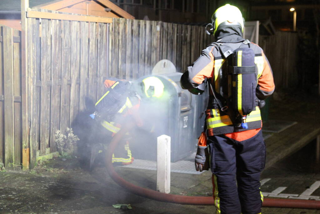 Ondergrondse container in brand