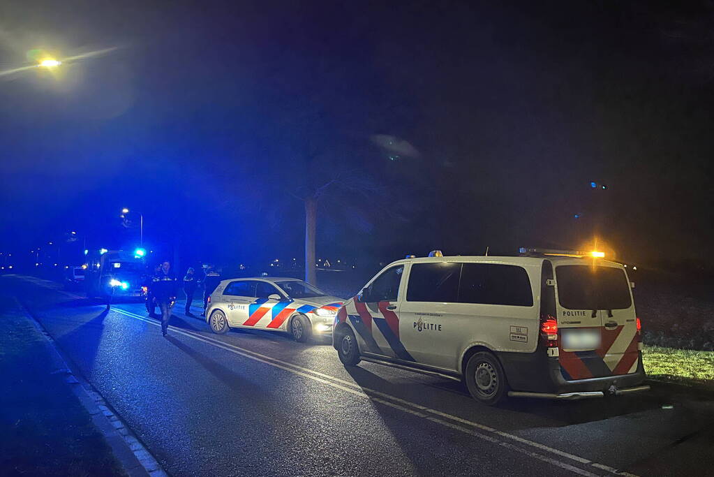 Twee personen ten val met motor