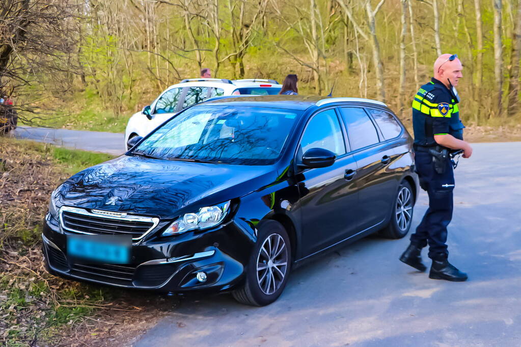 Taxi en scooterrijder in botsing