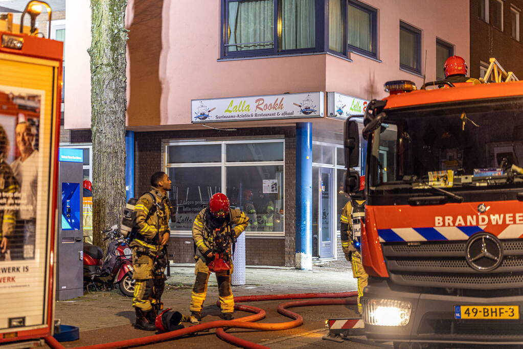 Gezin uit woning gered door brandweer