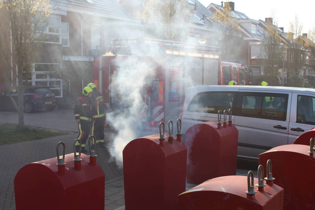 Brand in ondergrondse papiercontainer