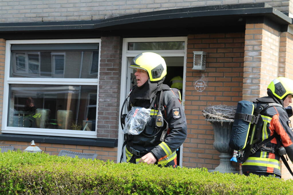 Verbrande hamburgers zetten woning vol rook