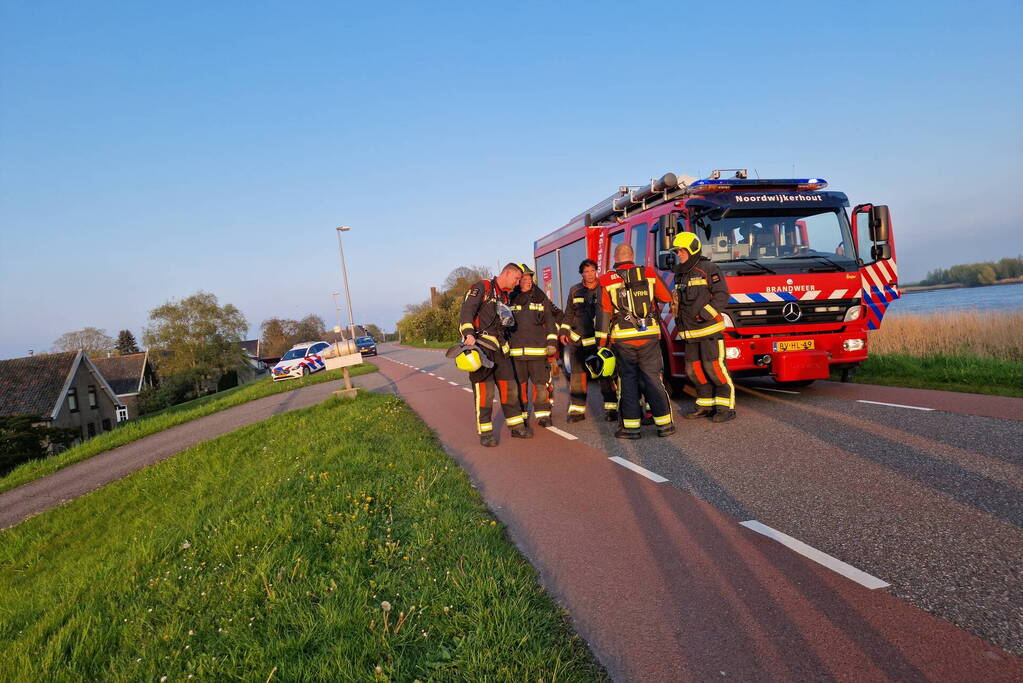 Brand in rietenkap van woning