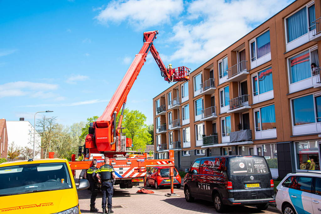 Brand in slaapkamer van portiekwoning