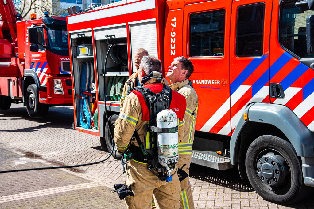 Brand in slaapkamer van portiekwoning