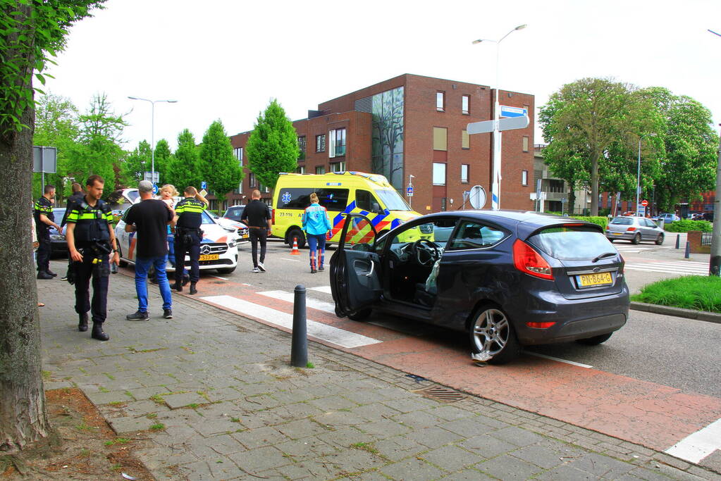 Schade na botsing op kruising