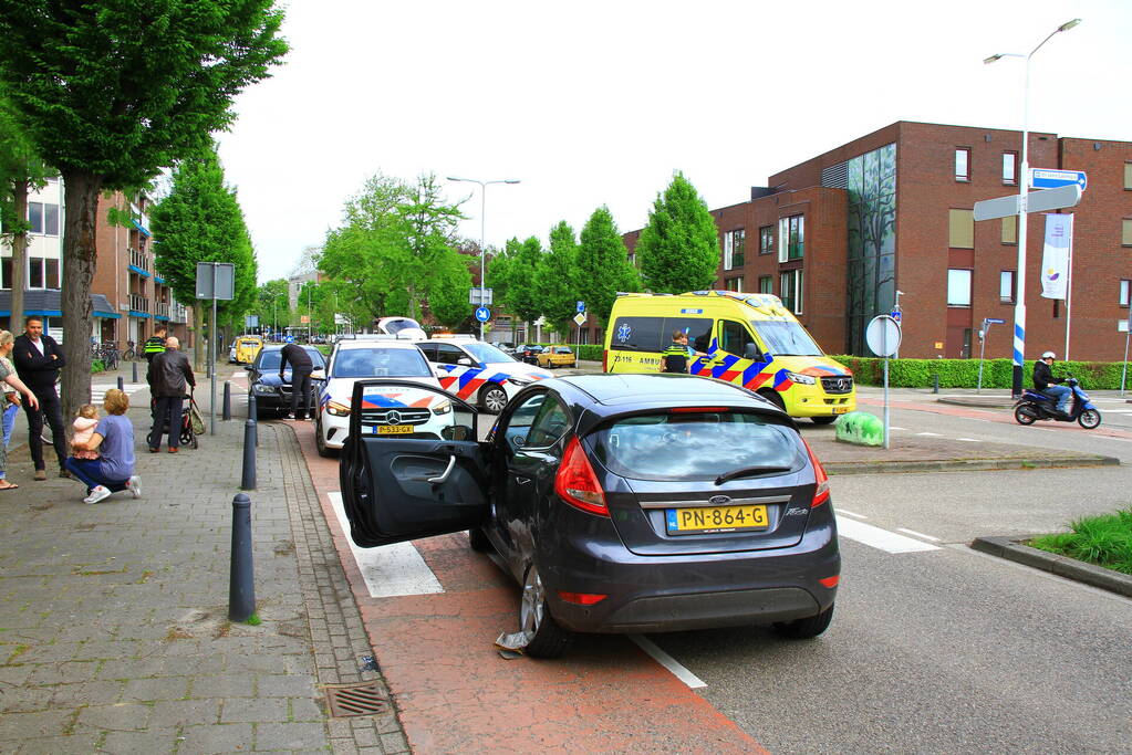 Schade na botsing op kruising