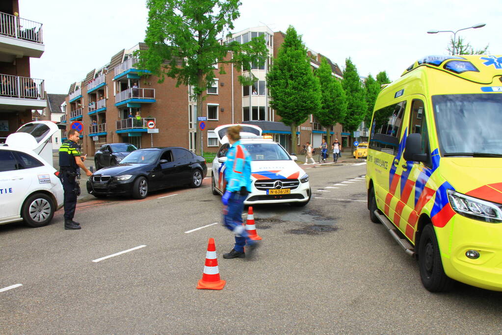 Schade na botsing op kruising