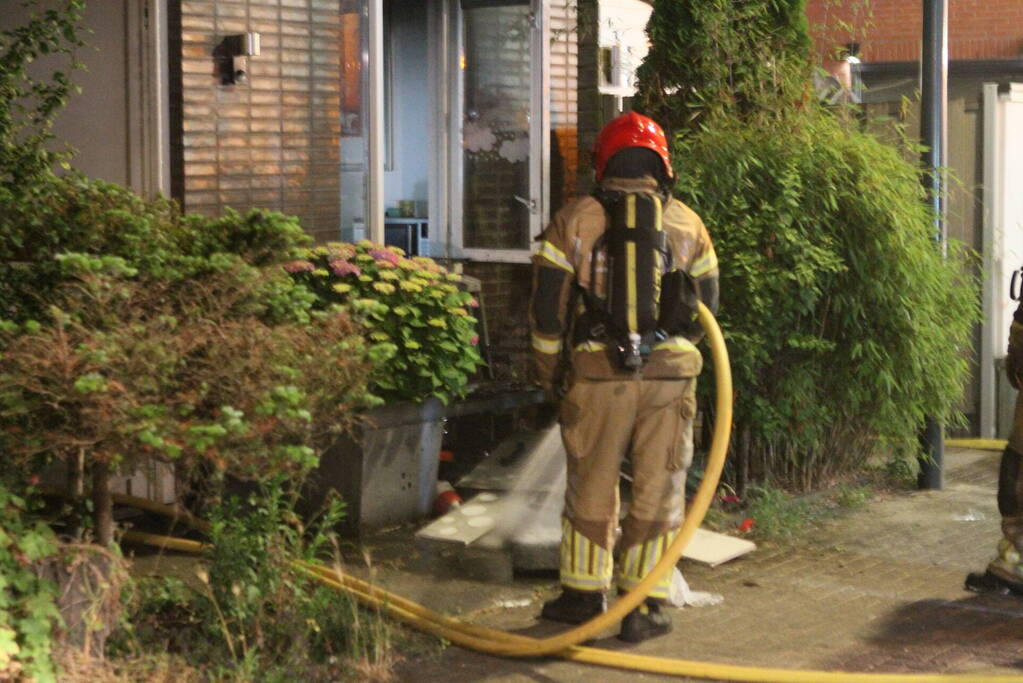 Buurman ontdekt brand in woning