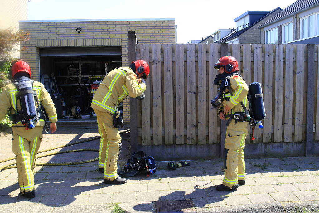 Brand in garage van woning