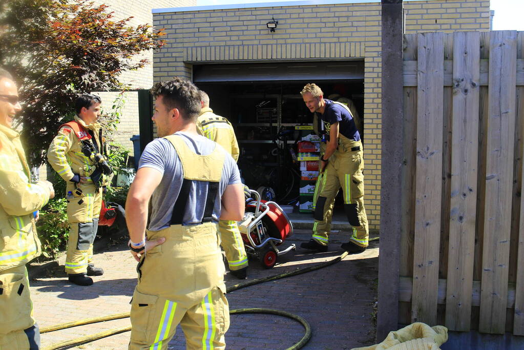 Brand in garage van woning