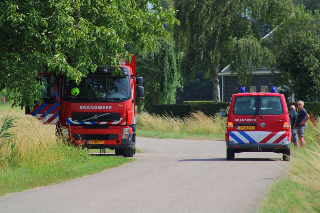 Brand in muur van schuur