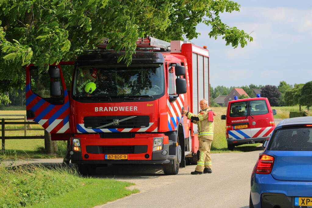 Brand in muur van schuur