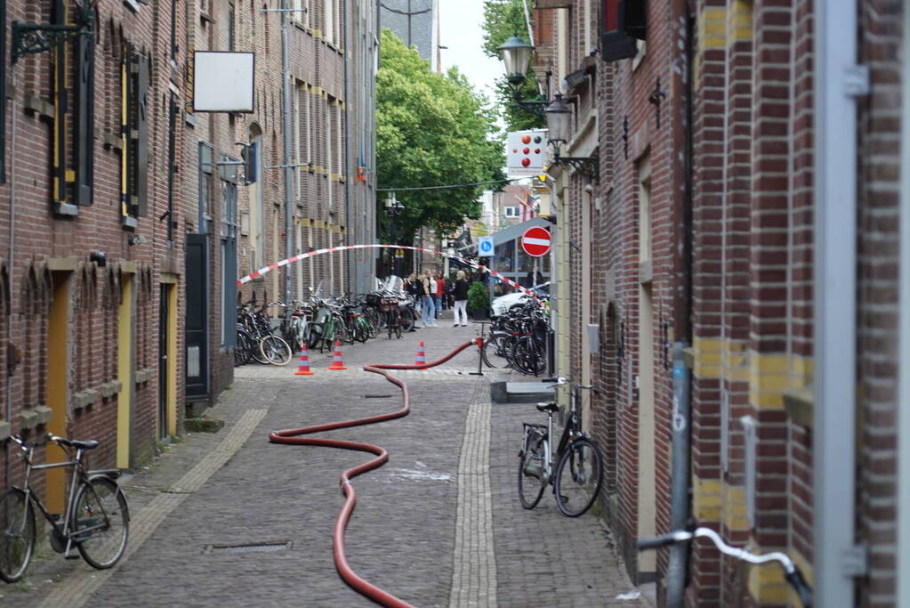 Brand in kapsalon door stapel handdoeken