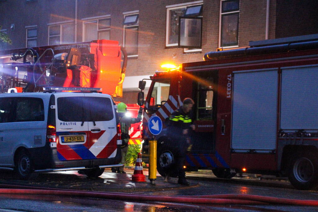 Brand in woning, persoon aangehouden