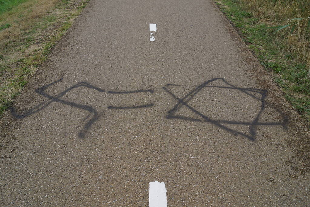 Fietspad voorzien van aanstootgevende tekeningen