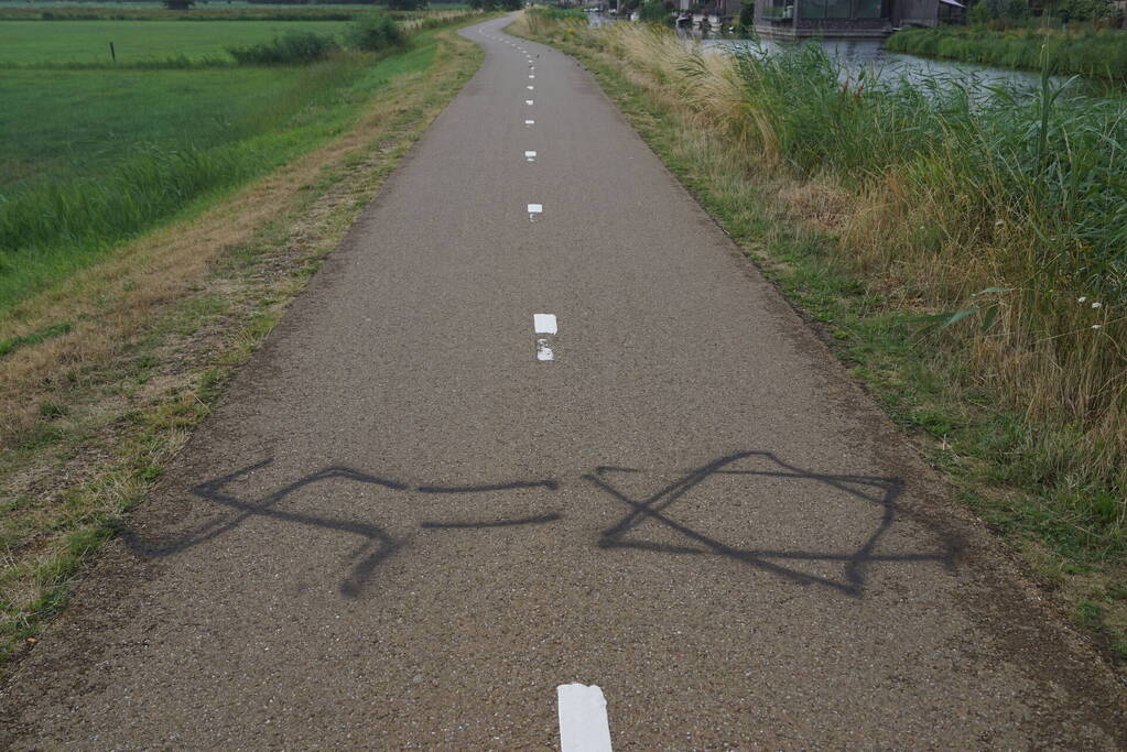 Fietspad voorzien van aanstootgevende tekeningen