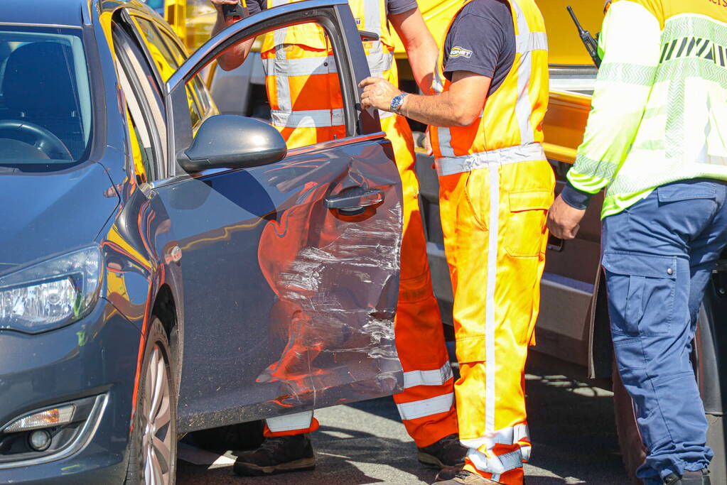 Flinke file door botsing op snelweg