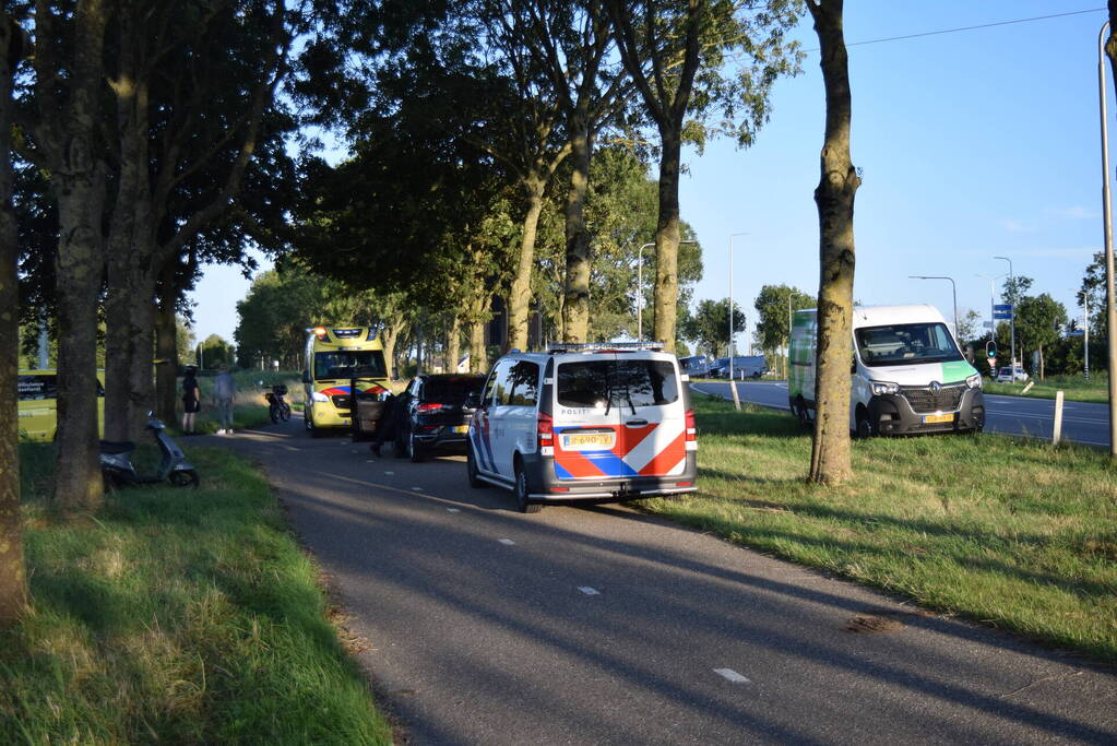 Ongeval met scooterrijder op fietspad