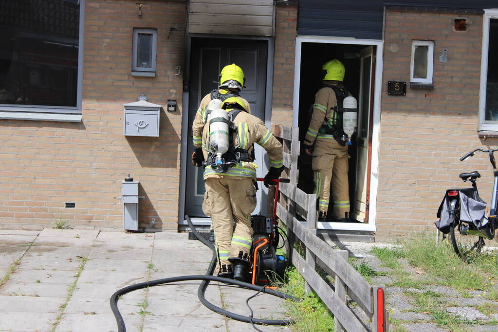 Woning flink beschadigd na brand, brandstichter aangehouden