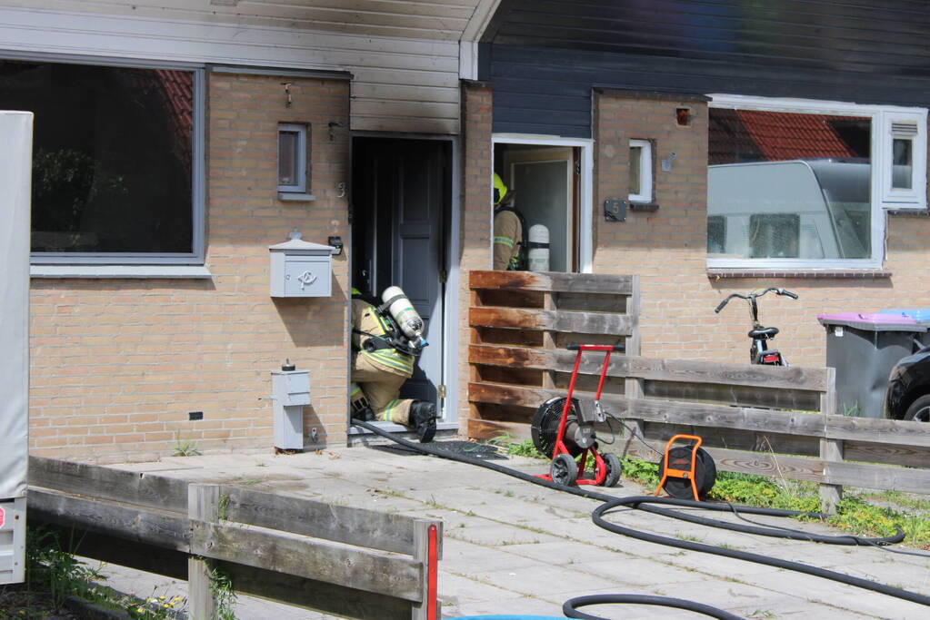 Woning flink beschadigd na brand, brandstichter aangehouden