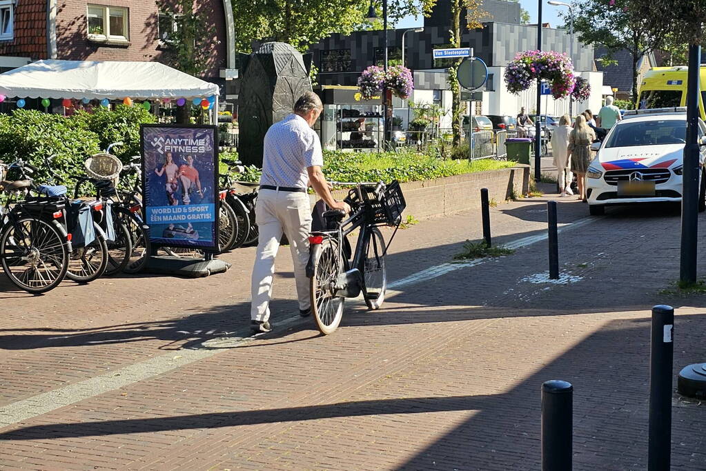 Persoon ten val met fiets