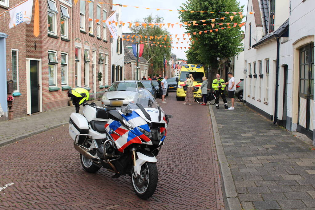 Fietser gewond bij botsing met openstaande portier