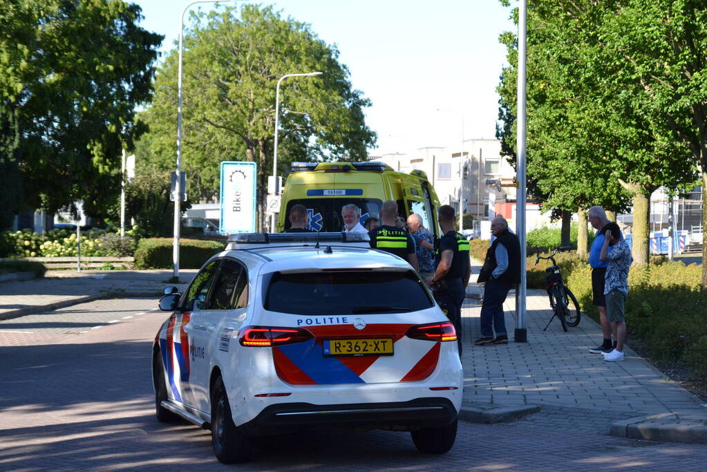 Persoon ten val met elektrische fiets