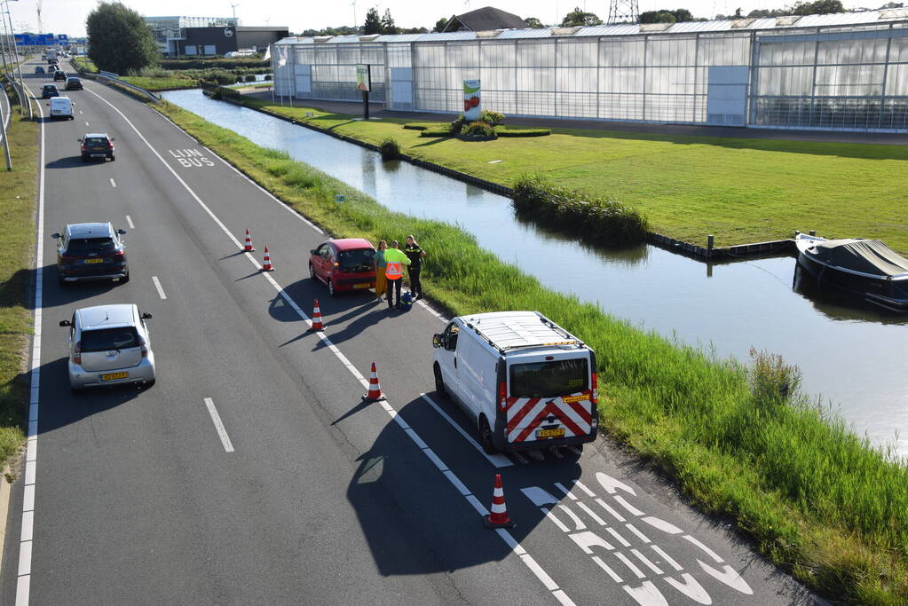 Schade bij botsing tussen bestelbus en auto