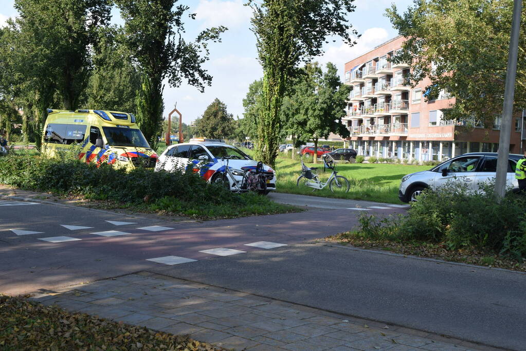 Automobilist en fietser in botsing