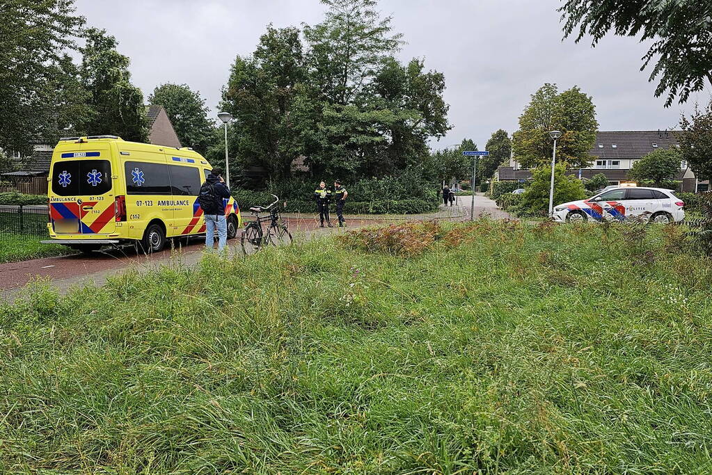 Fietsers ten val door nat wegdek