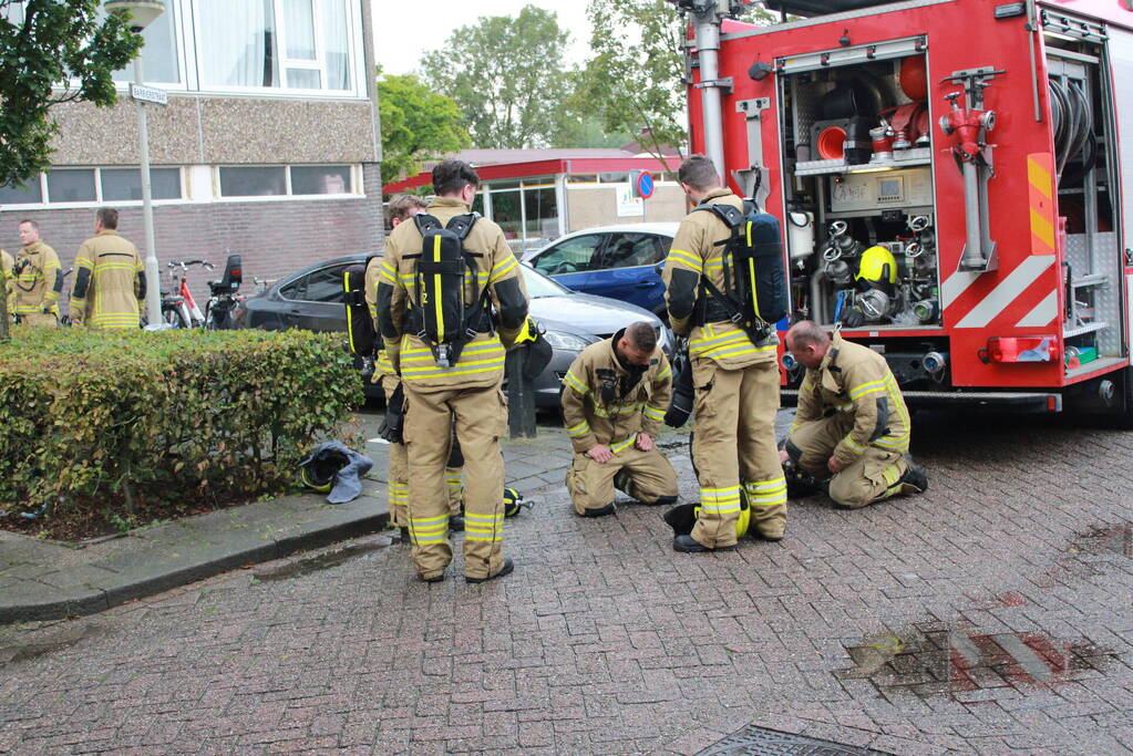 Rookontwikkeling in flat na brand