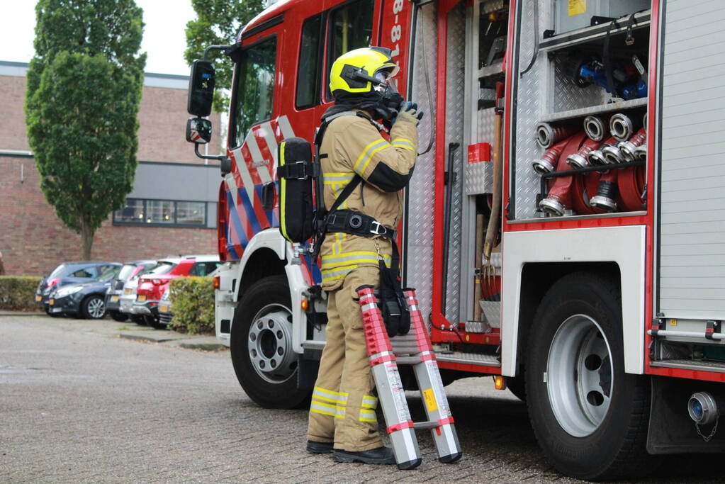 Rookontwikkeling in flat na brand